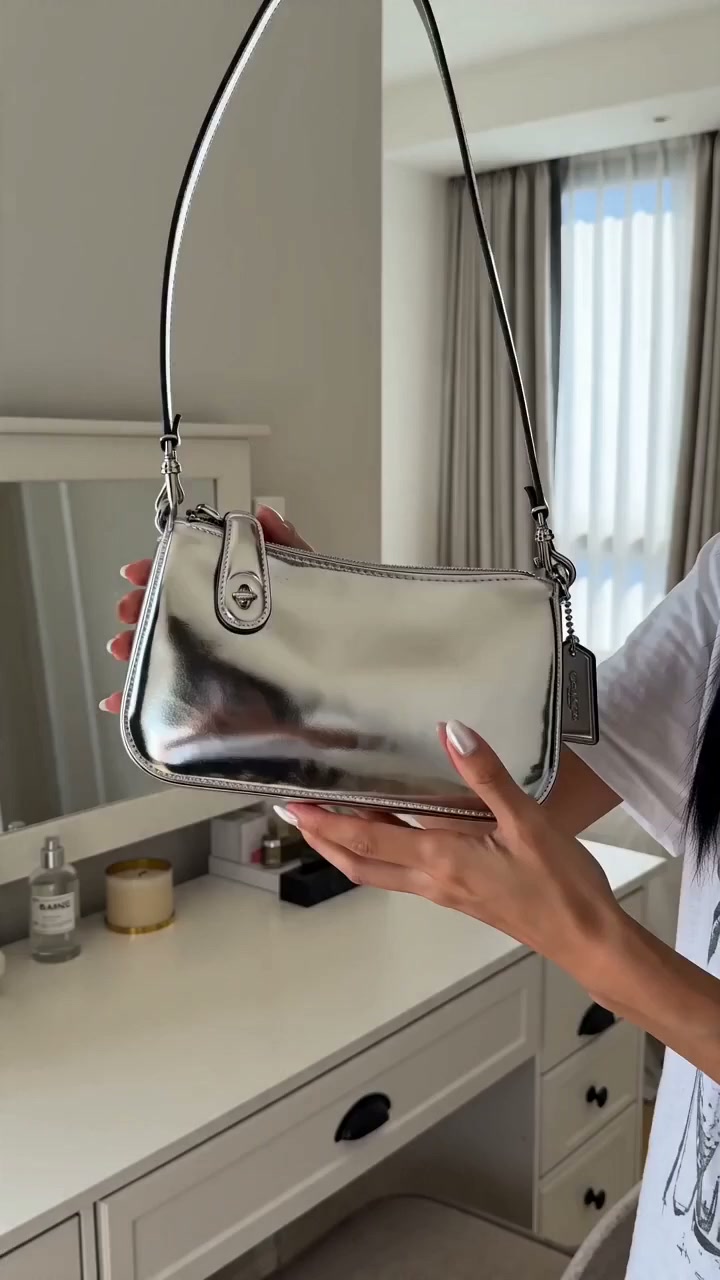 Sakura silver metallic shoulder bag Try-On